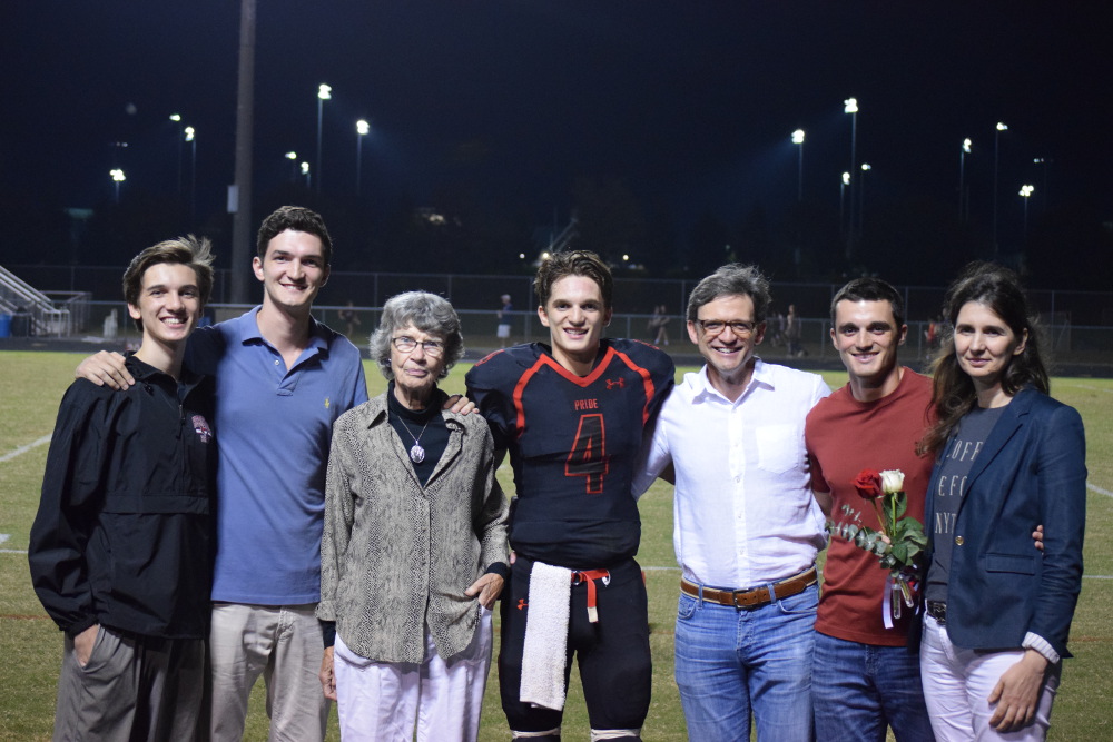 In front of his family on senior night, Heritage senior quarterback Alex Carlin scored as time expired to give the Pride the 41-38 win over John Champe. Full photo gallery by Dylan Gotimer!